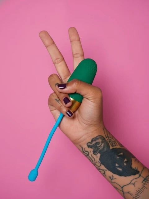 Hand with pink vibrator